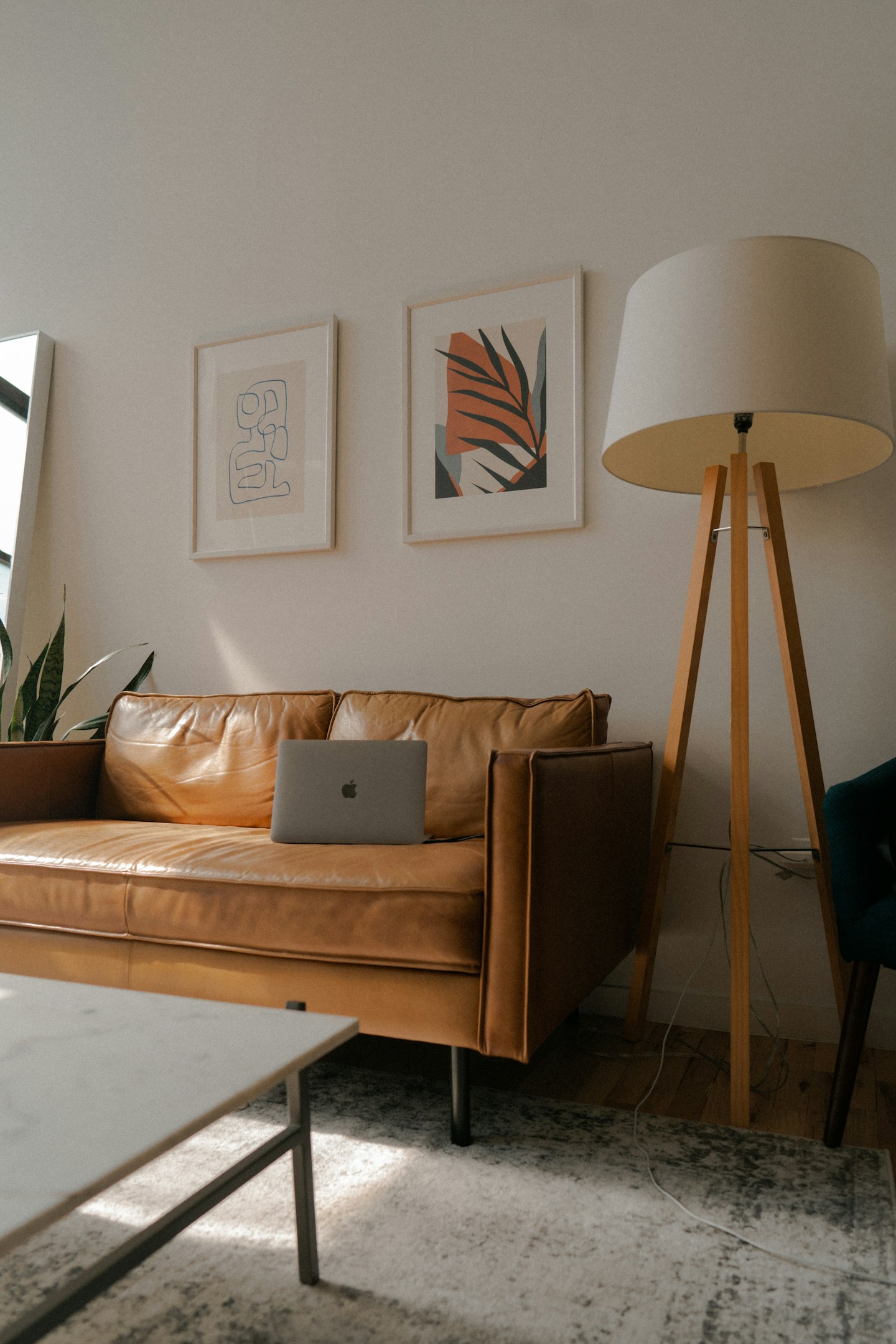 White lounge chair in a warmly lit Brooklyn loft